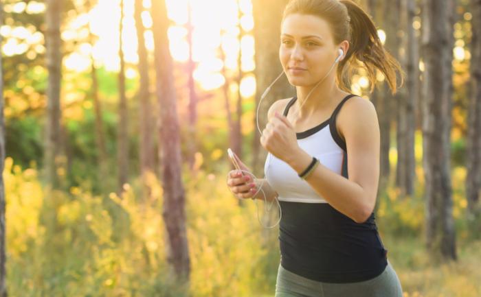 A woman jogging in nature